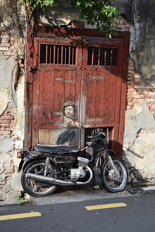Explore the Iconic Street Art of Penang: Boy on a Bike