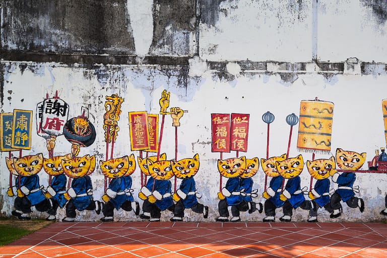 Explore the Iconic Street Art of Penang: An army of chinese cats